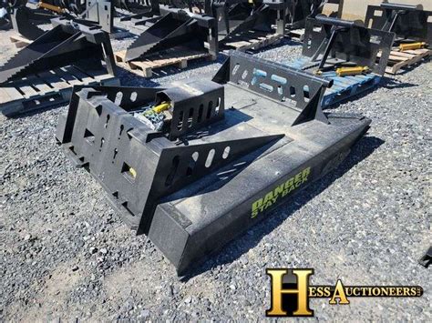 mid state skid steer attachments